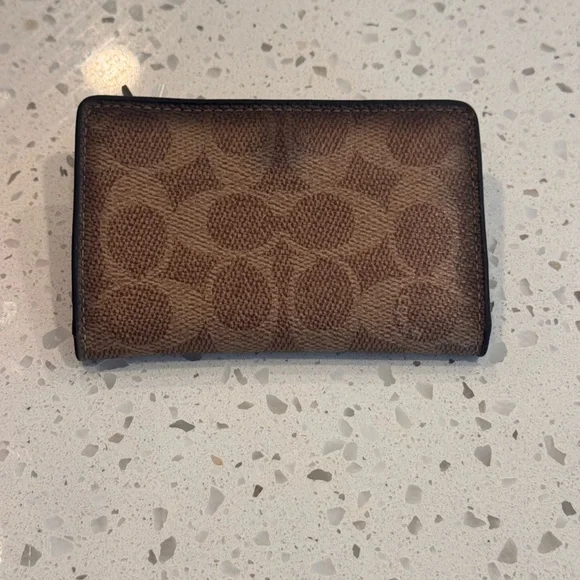 Coach Brown Laptop Bag with Monogram Pattern